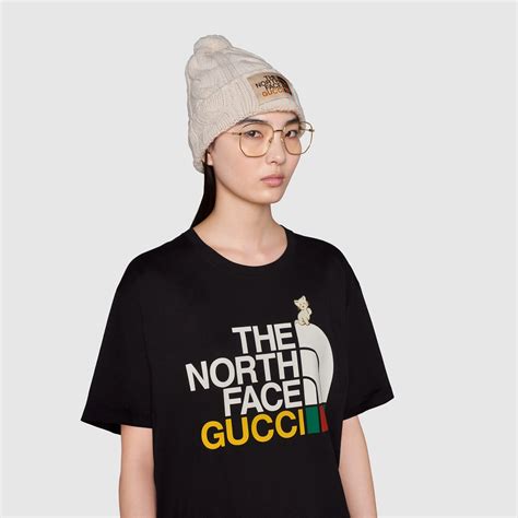 camiseta gucci north face